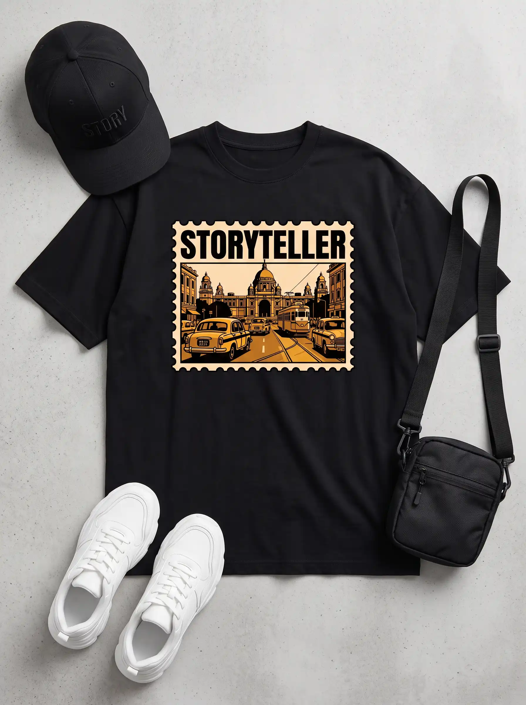 Storyteller graphic t-shirt flat lay with cap, sling bag and white sneakers