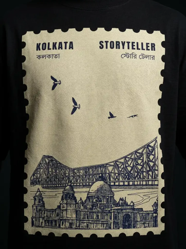 Back print of a Storyteller Kolkata t-shirt featuring Howrah Bridge and birds in a postage-stamp design